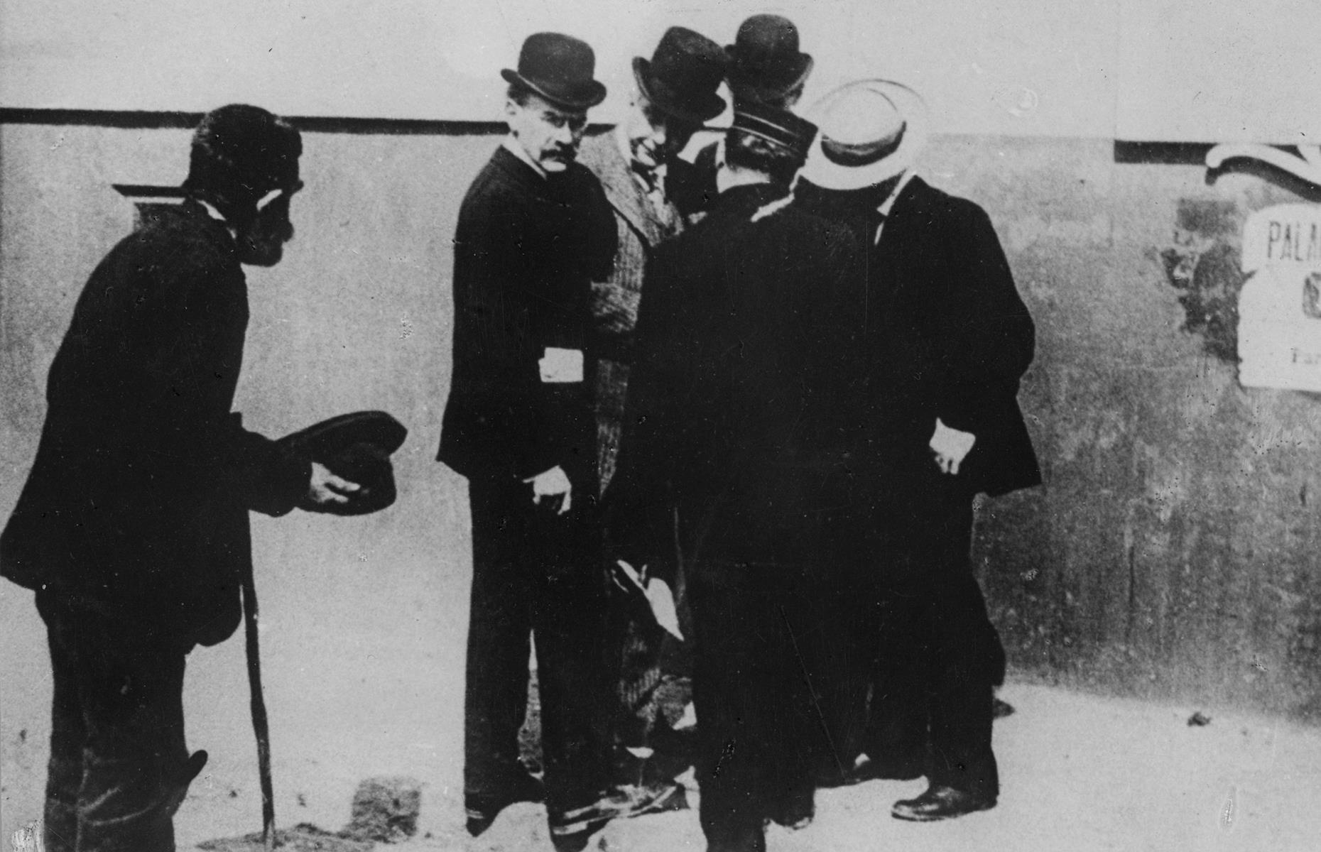 1880s: Rockefeller ignoring a beggar
